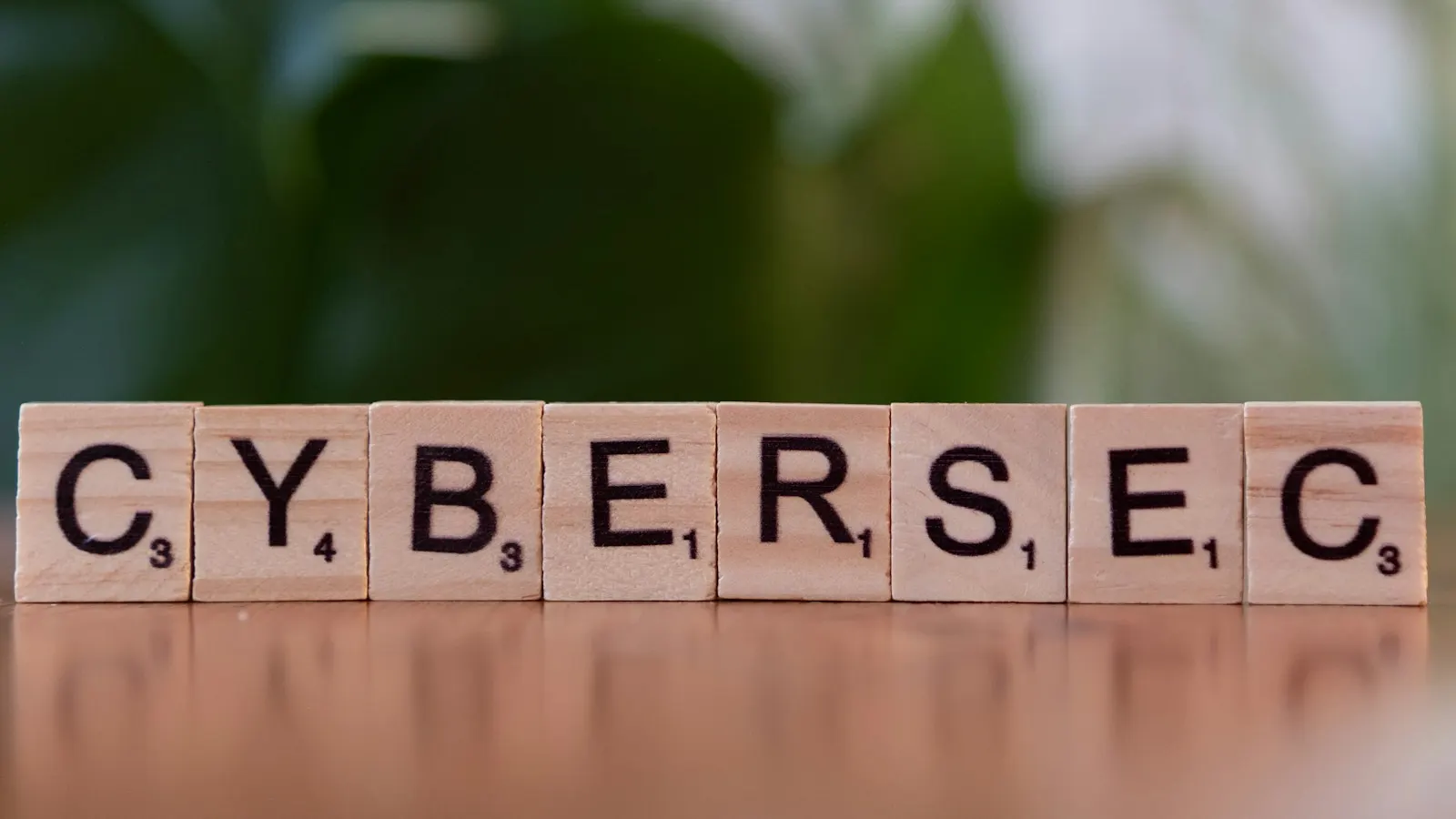 Wooden blocks spelling cybersec on a table
